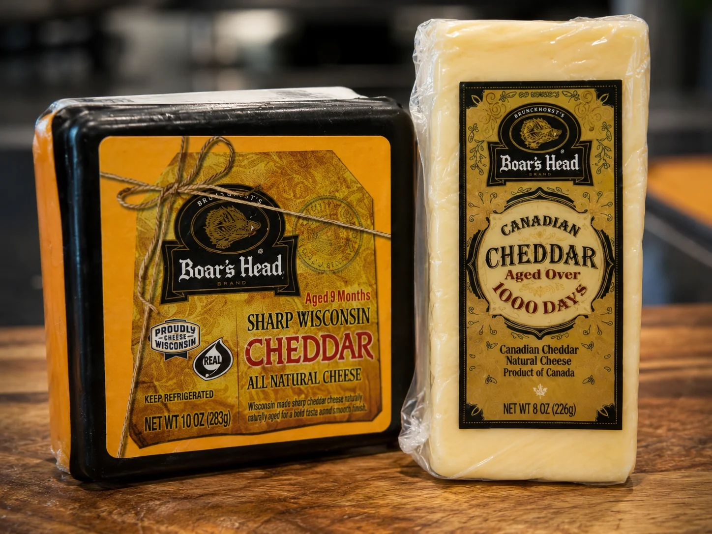 Boar’s Head Sharp Wisconsin Cheddar aged 9 months beside Boar’s Head Canadian Cheddar aged over 1,000 days